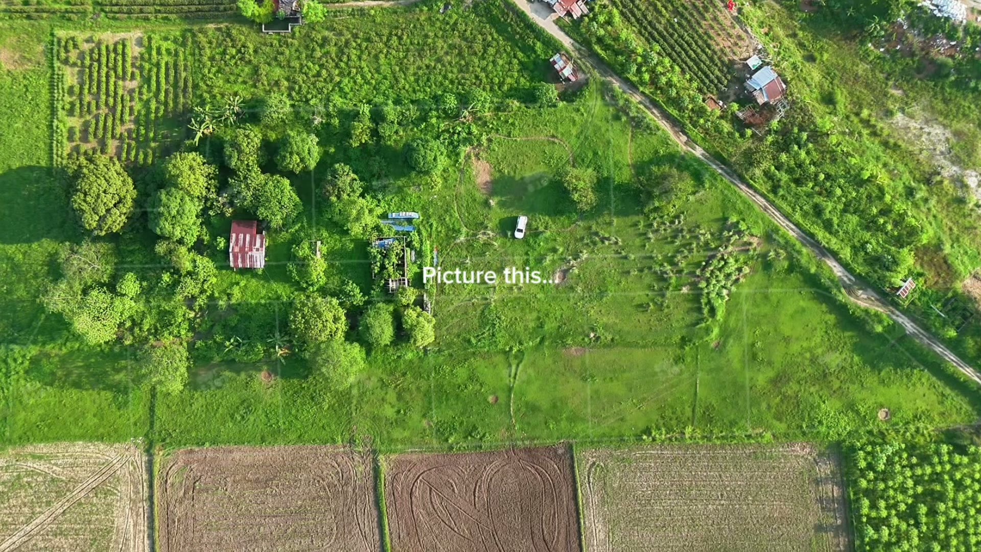 Panoramic aerial view of the Zambales mountain range beyond the property